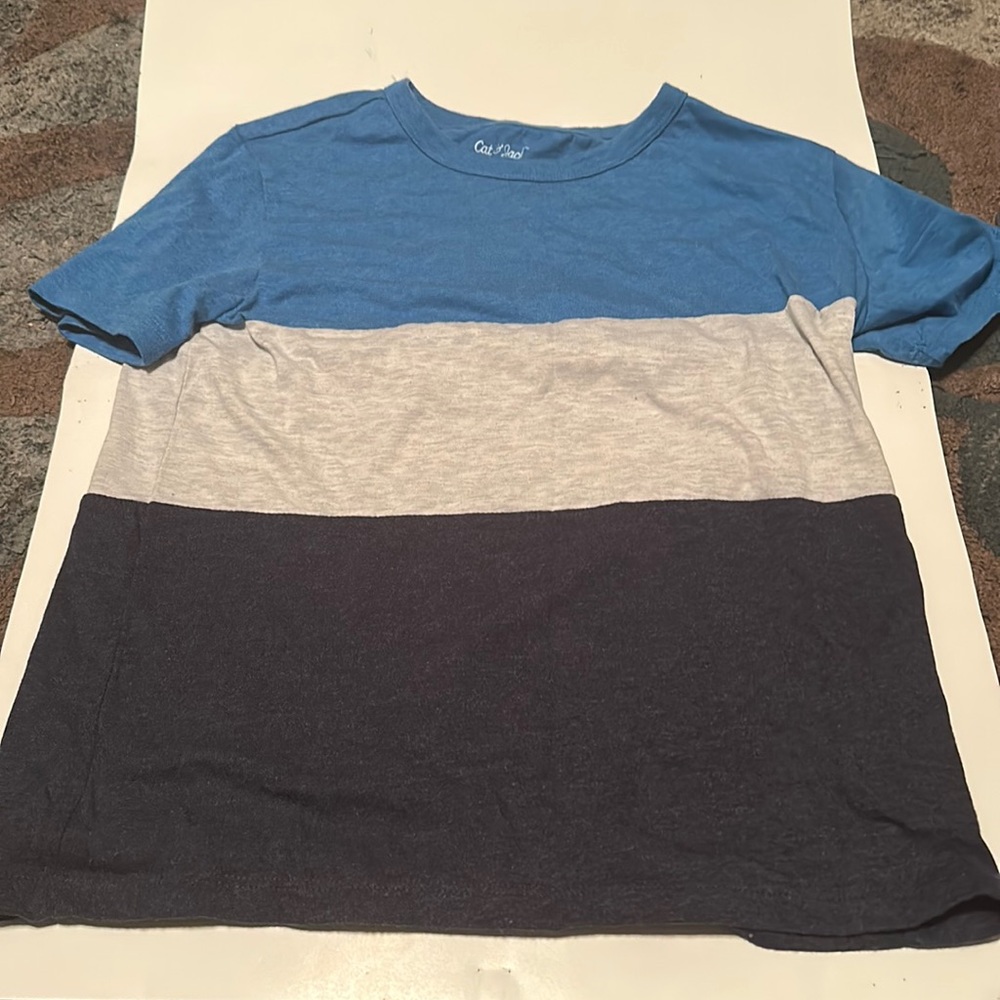 Blue shirt with grey and black stripes
